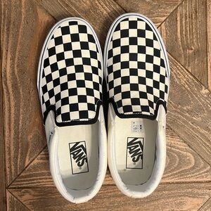 Vans black and white check slip on shoes. Mens Size 7. Like new.